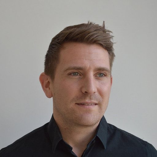 Headshot of Aaron Thomas, Managing Director at Hive19