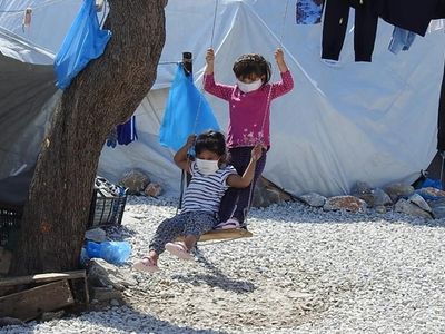 Children playing with masks on