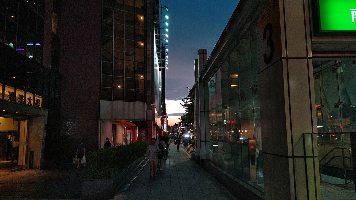 Nanjing East Road in Taipei in the evening, next to Exit 3 of Nanjing Fuxing MRT station