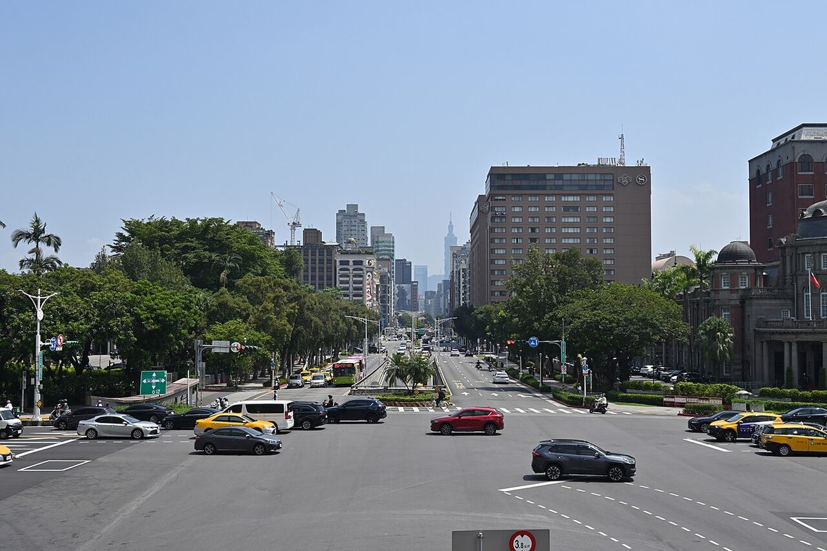 Zhongxiao Road in central Taipei on a clear day, with Taipei 101 in the distance