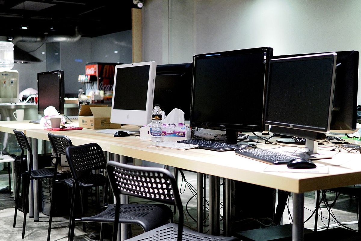 Shared desks and monitors in a Taipei coworking space
