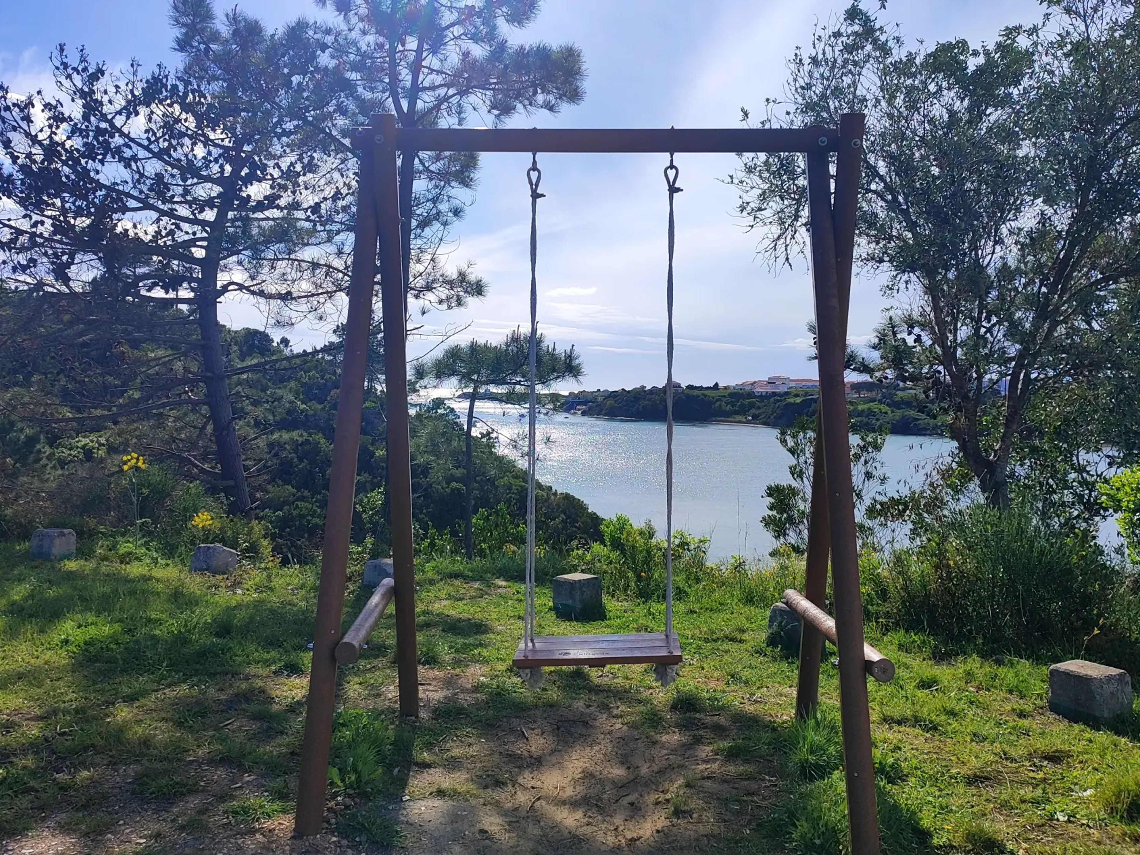 Swing next to Vila Nova de Milfontes Bridge, overlooking the Mira river