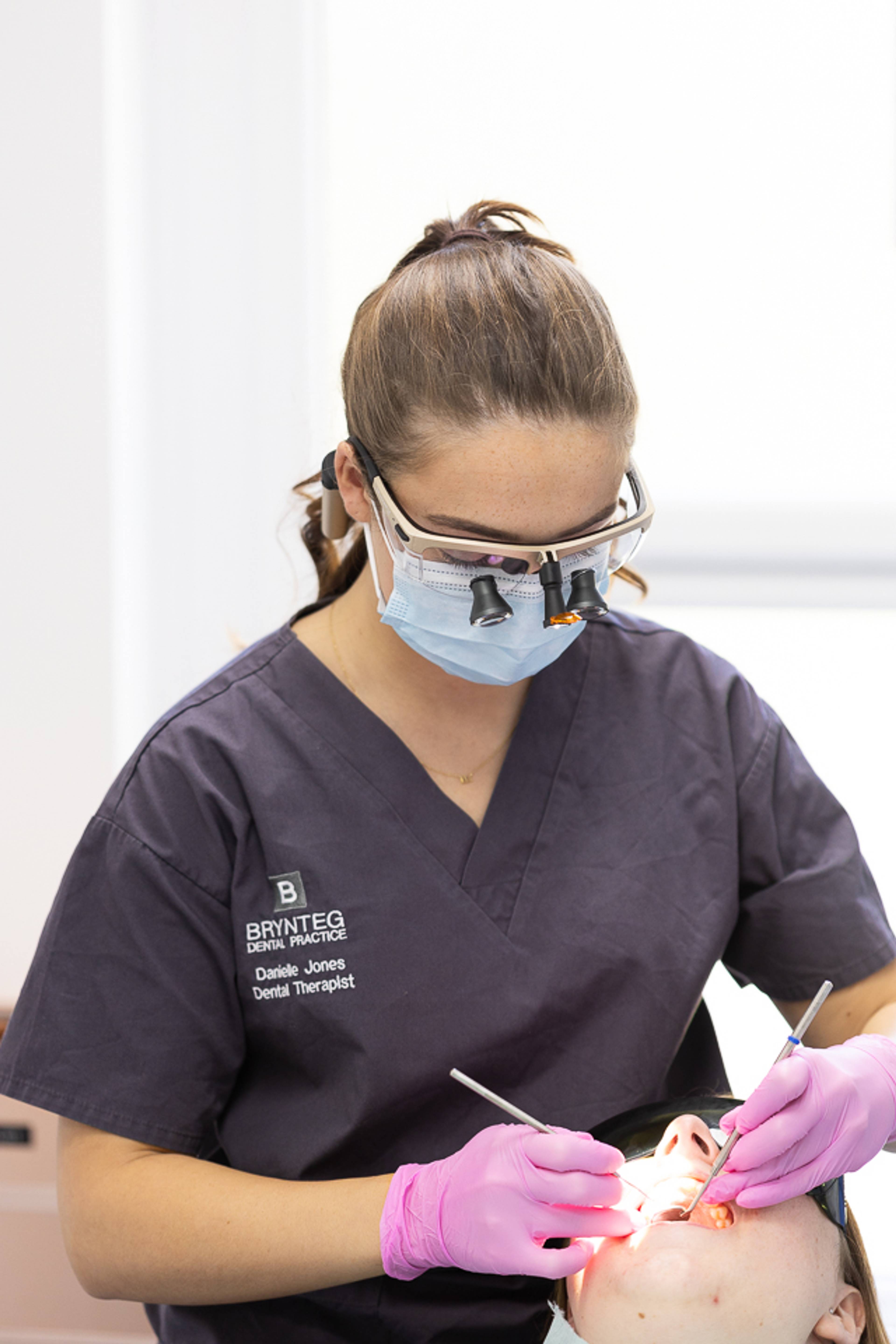 Smiling, friendly hygienist at Brynteg Dental