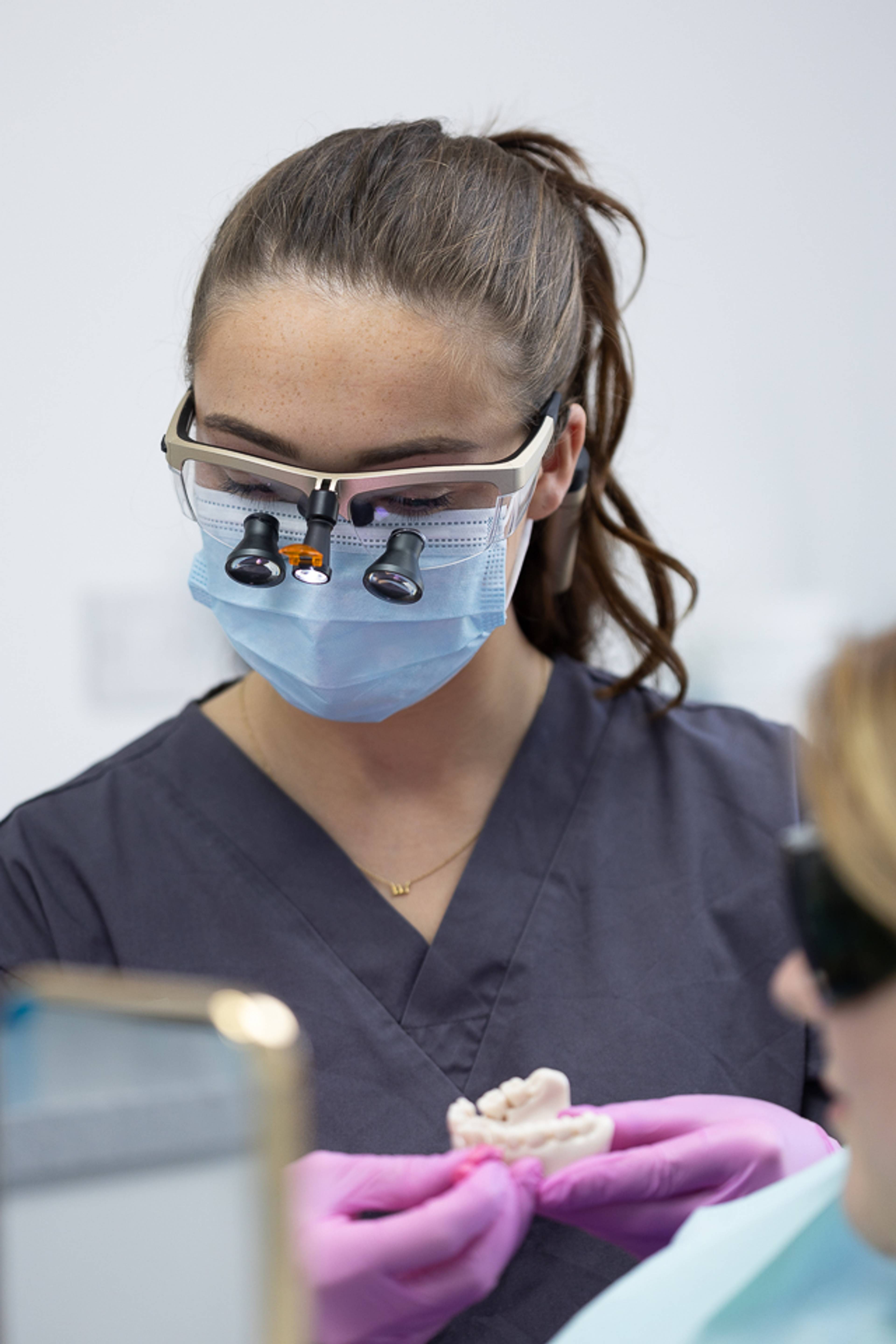 Dentist explaining teeth protection