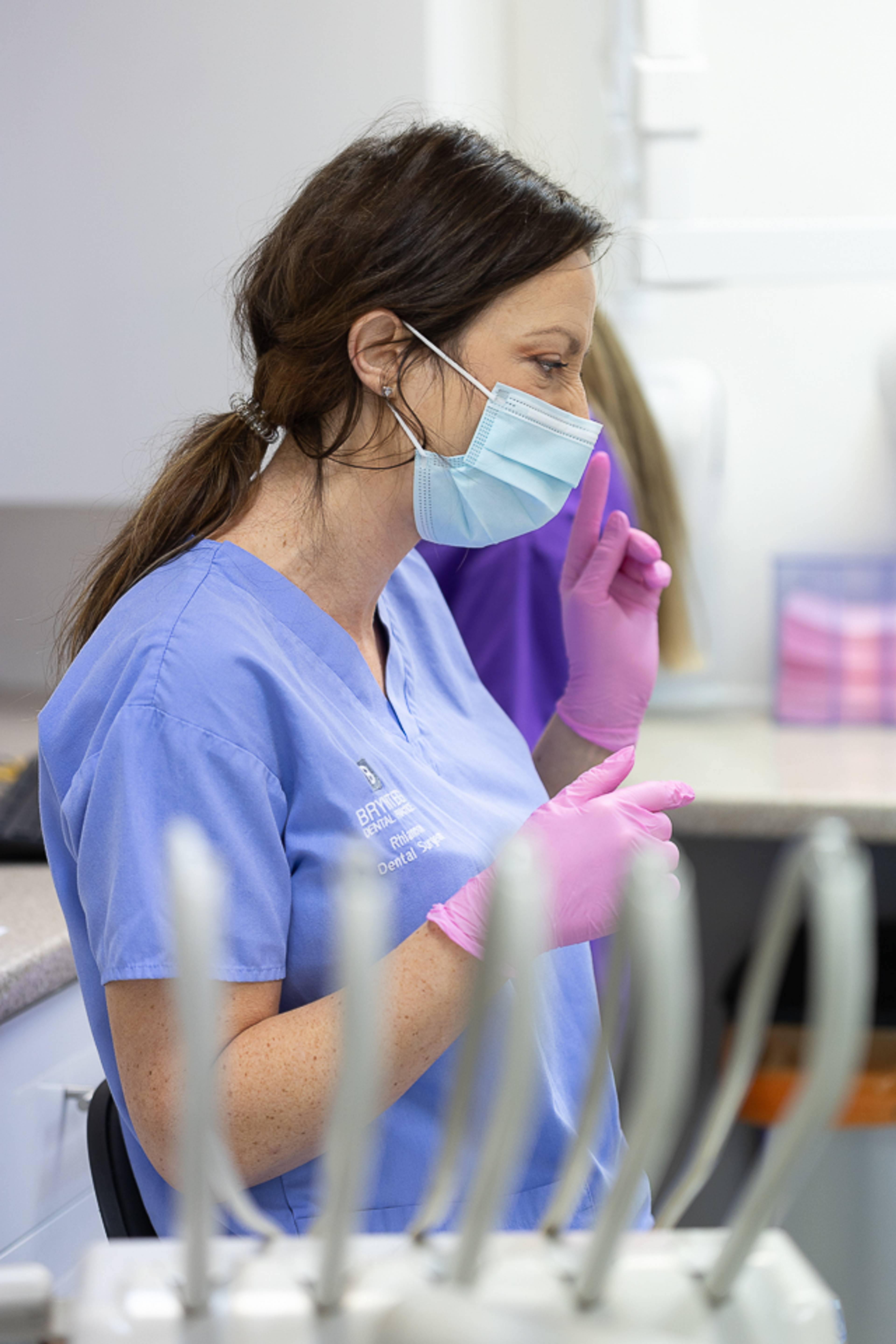 Dentist discussing treatment