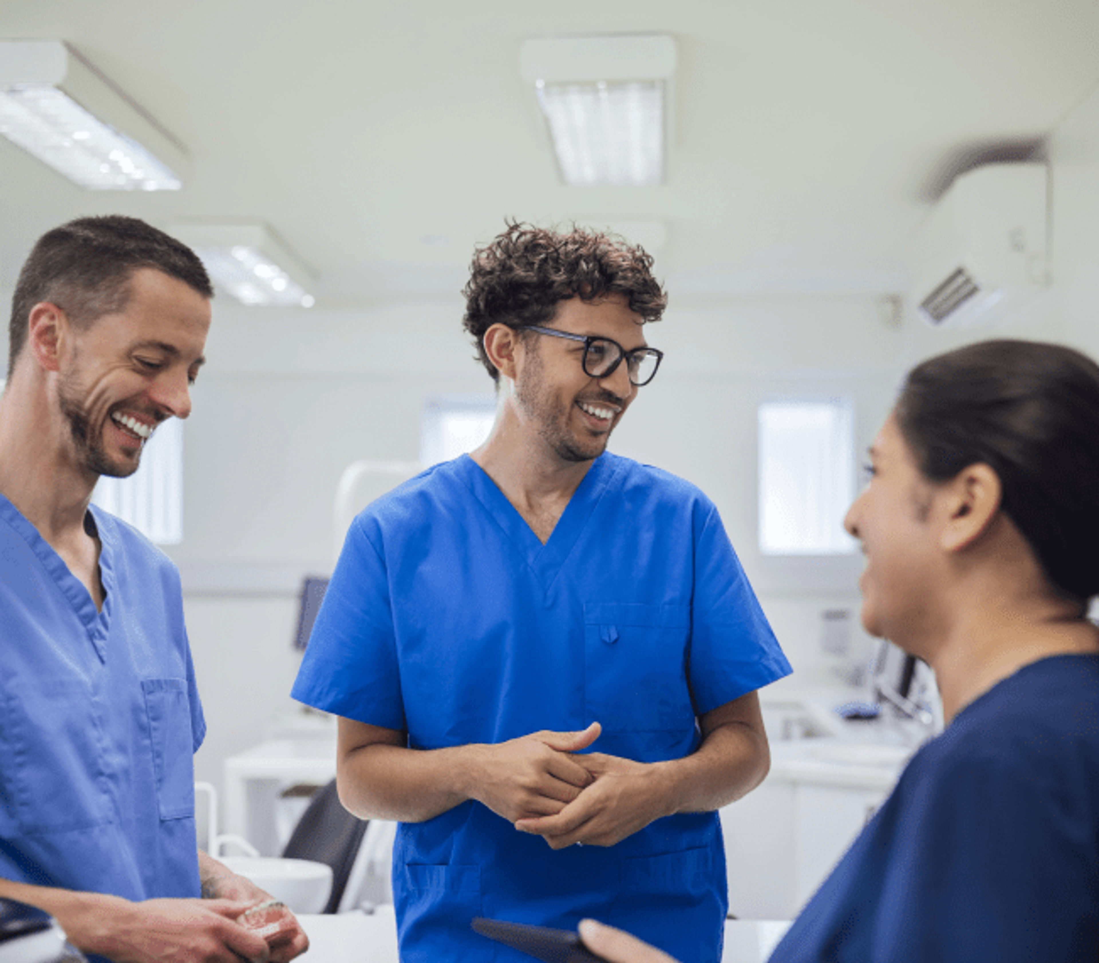 Three dental staff