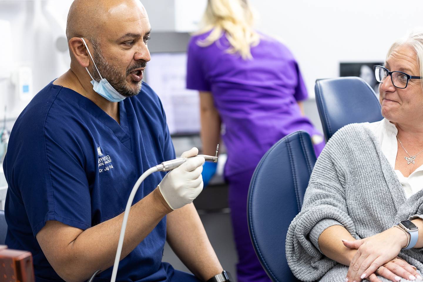 Dentist discussing treatment