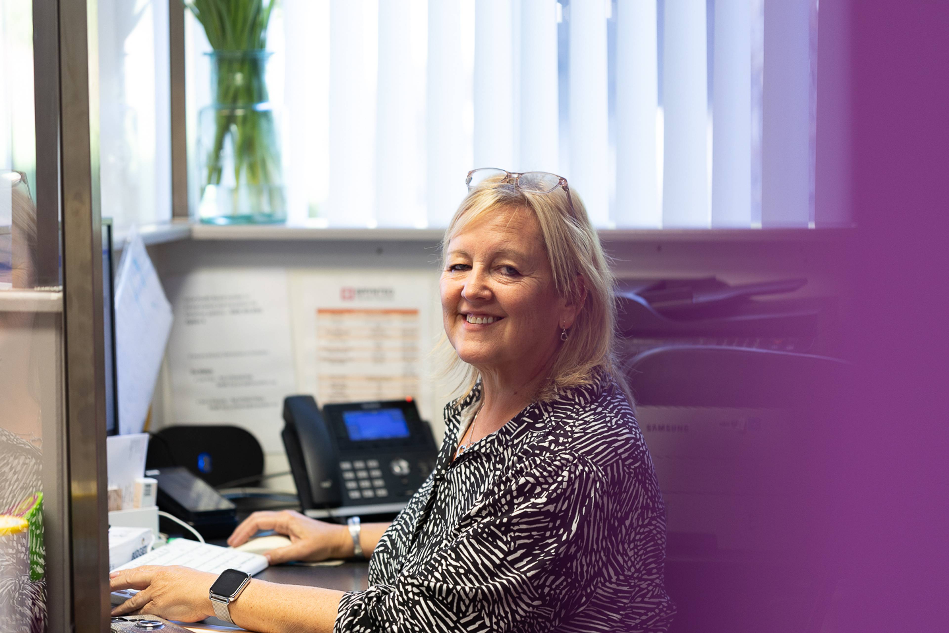 Friendly receptionist at Brynteg Dental