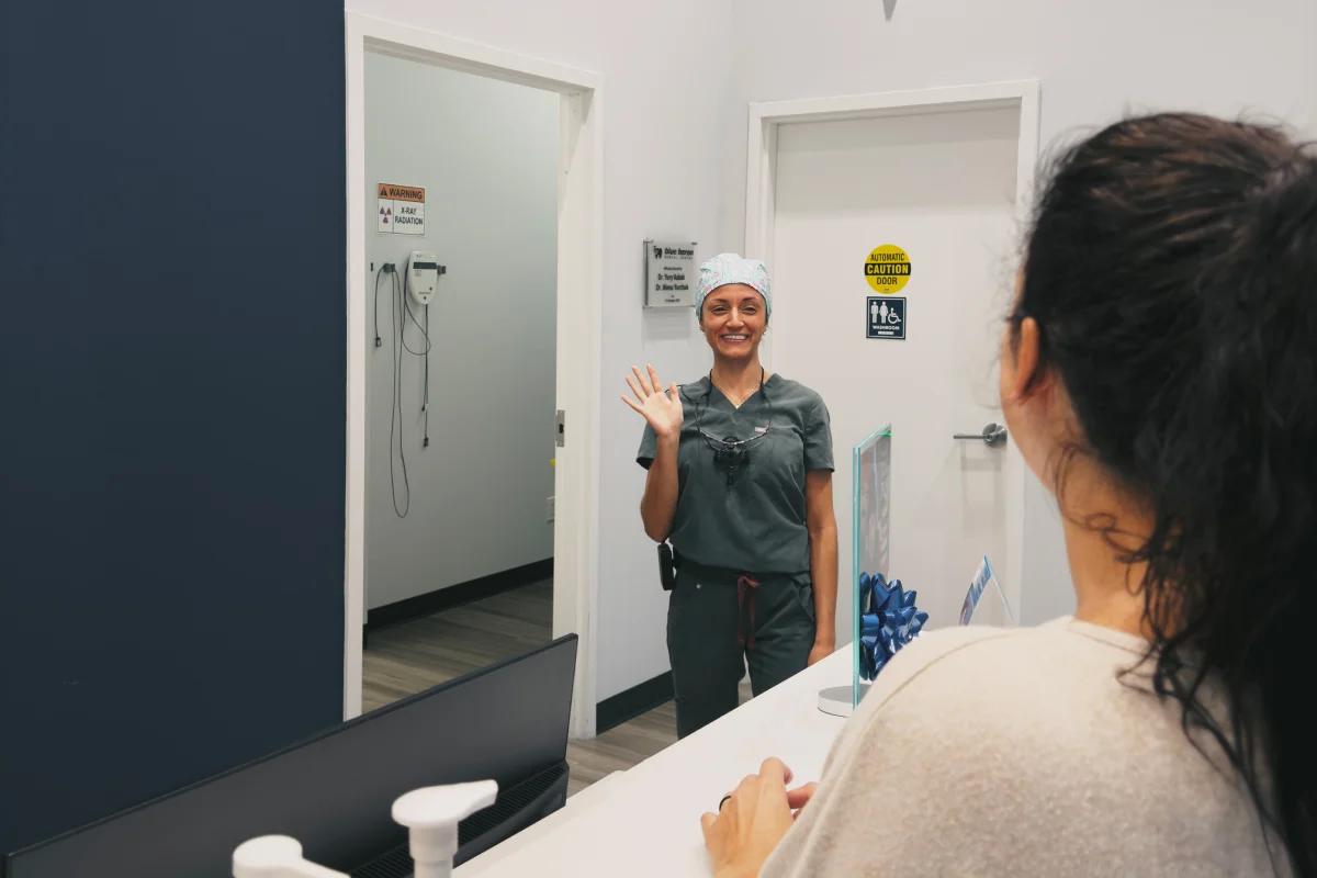 Hygienist wave to a patient