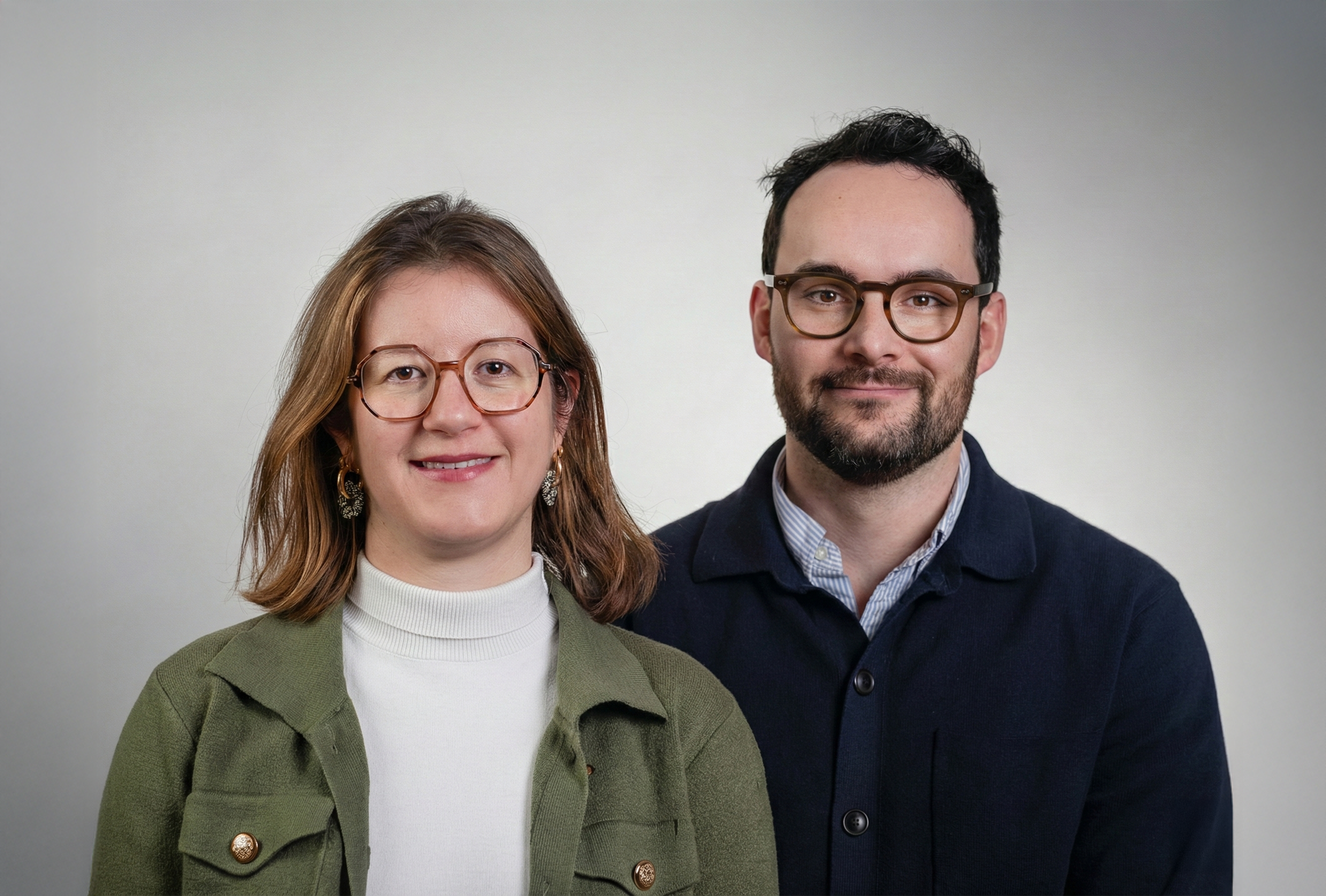 Close-up view of coiled copper wire with rich metallic tones and dramatic lighting, highlighting the texture and curvature of the metal.