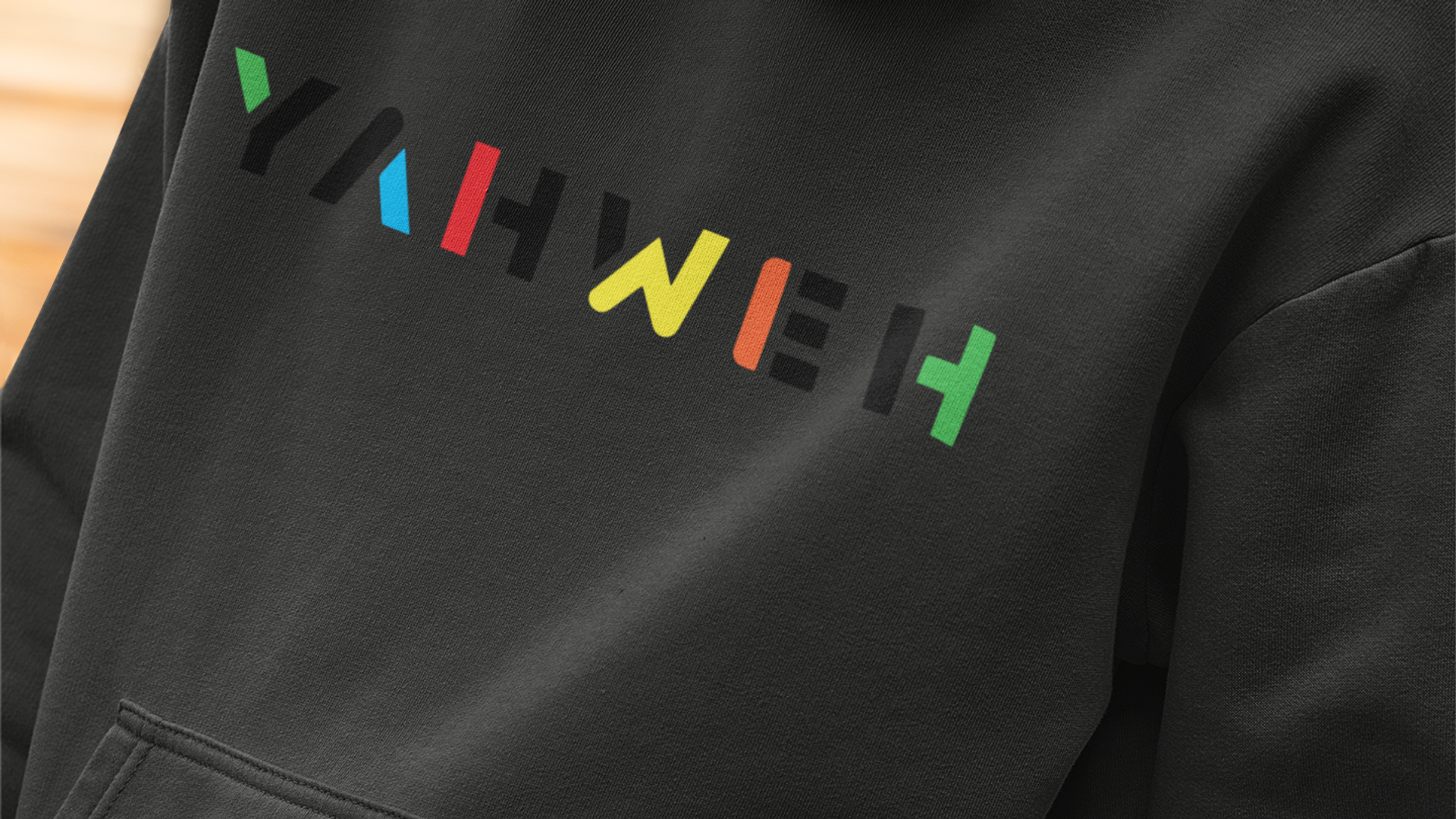 Dark hoodie with Yahweh text