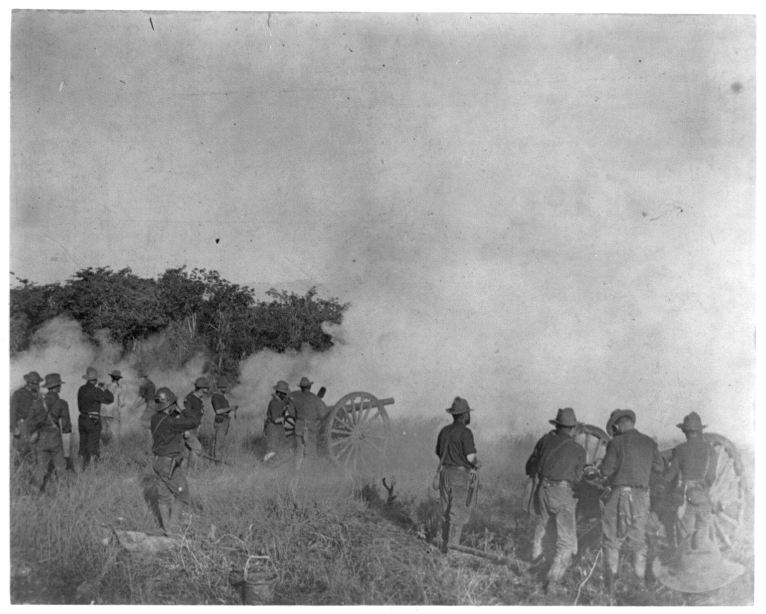 Capron's battery firing on the stone fort at El Caney, 1898