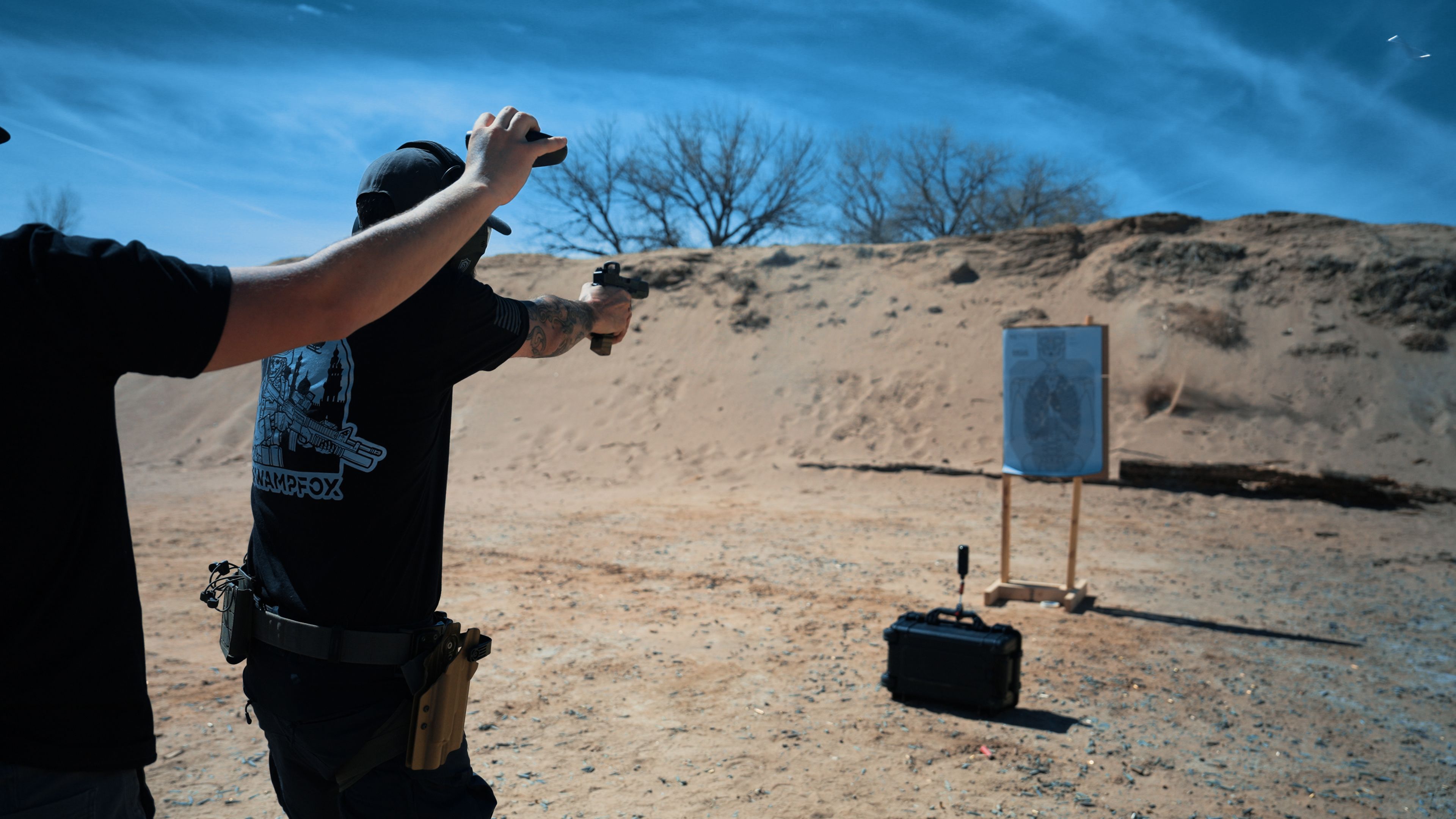 Shooter demonstrating the Mozambique drill at 7 yards