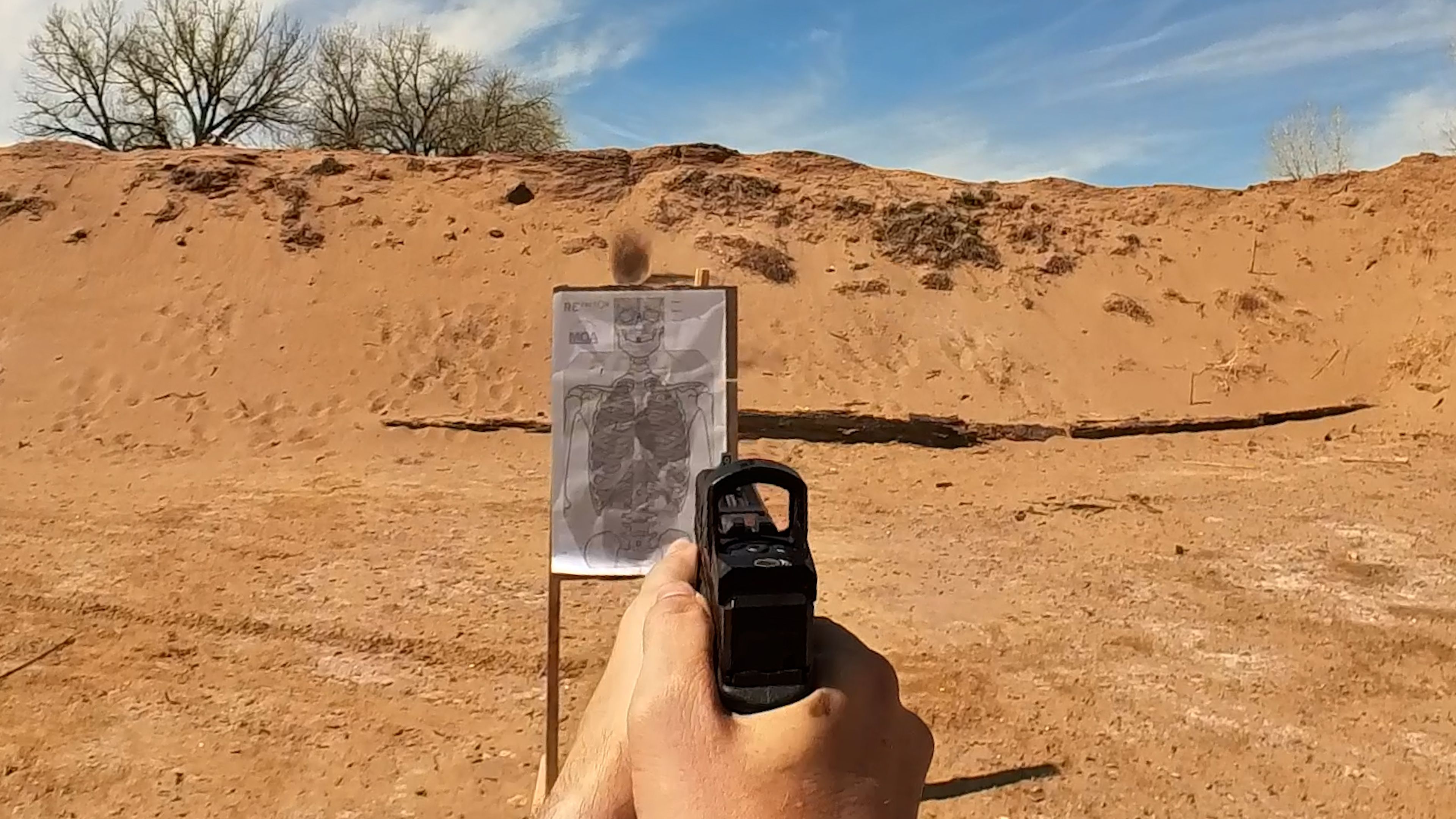 El Presidente drill start position, shooter back to three targets at 10 yards