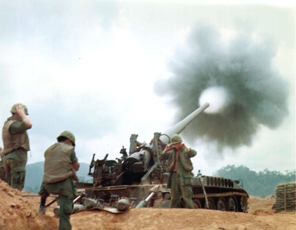 U.S. soldier firing artillery during the Vietnam War