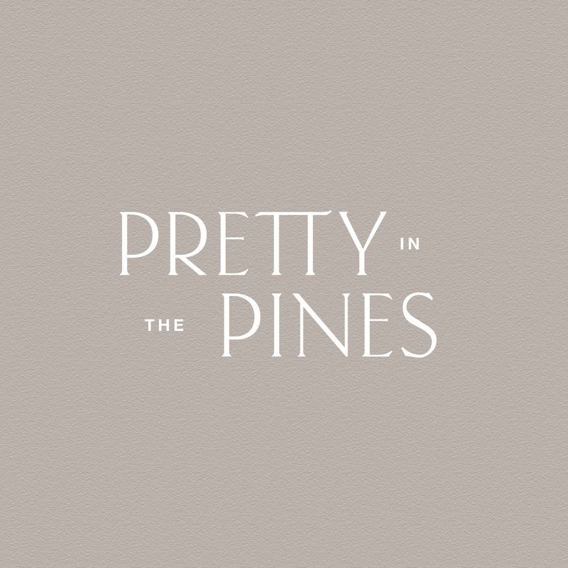 Taupe background with white type saying Pretty in the Pines