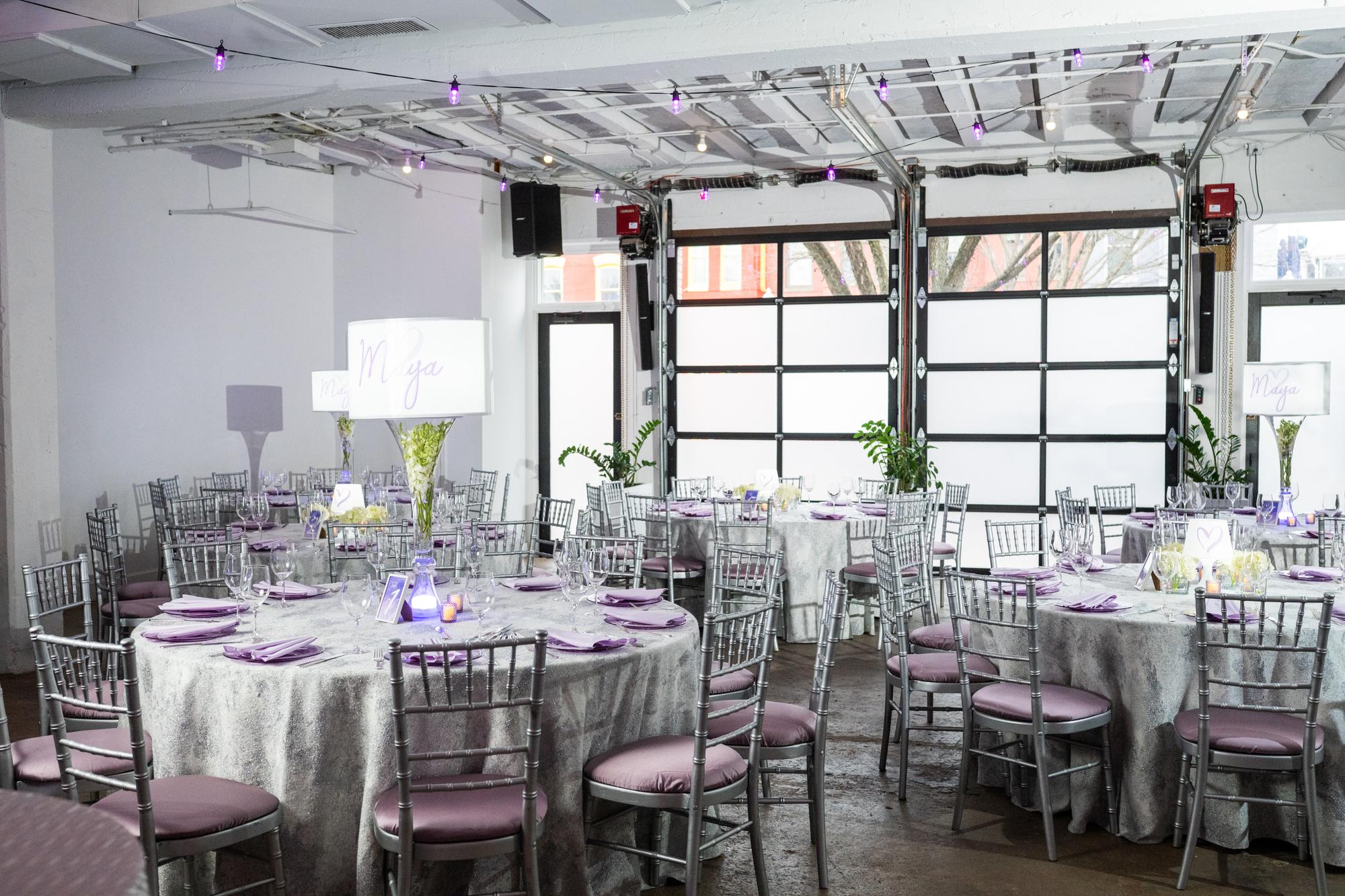 Bat mitzvah banquet with lavender lighting