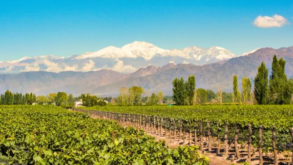 the andes mountains behind the region of mendoza argentina