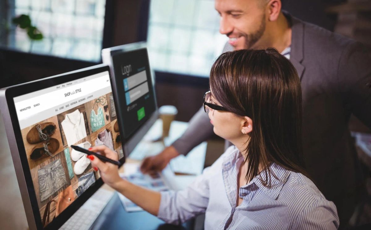 woman pointing at a ecommerce catalog