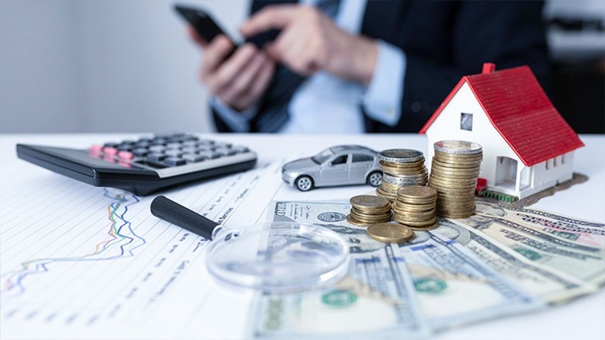 shared services finances, cash, coins, calculator, man on phone
