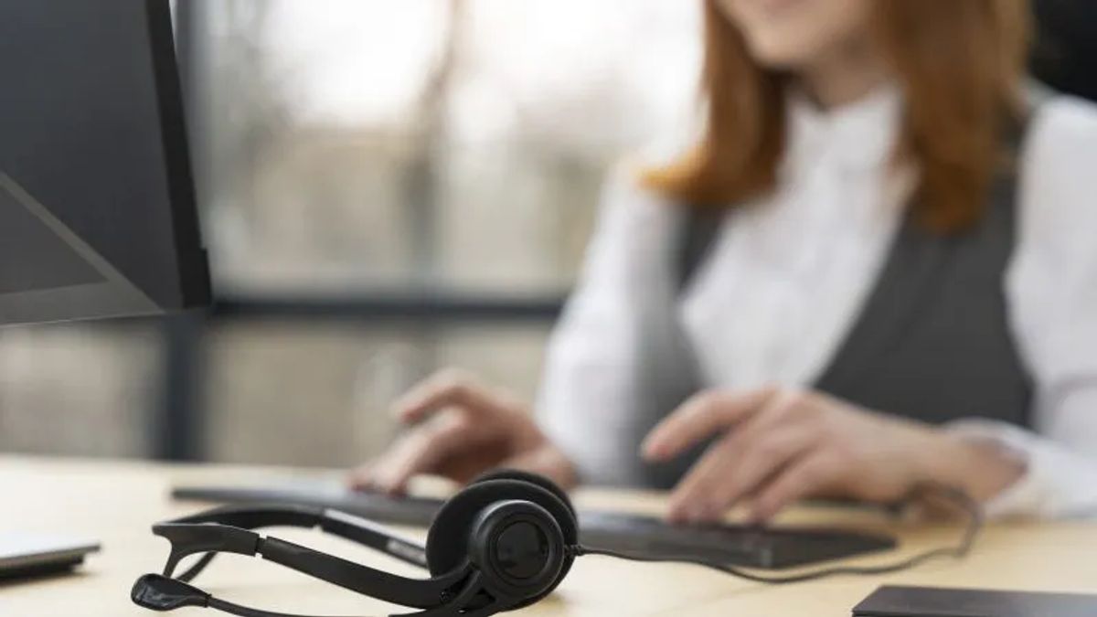 headset with woman in the background