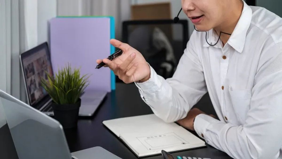 man having a meeting online