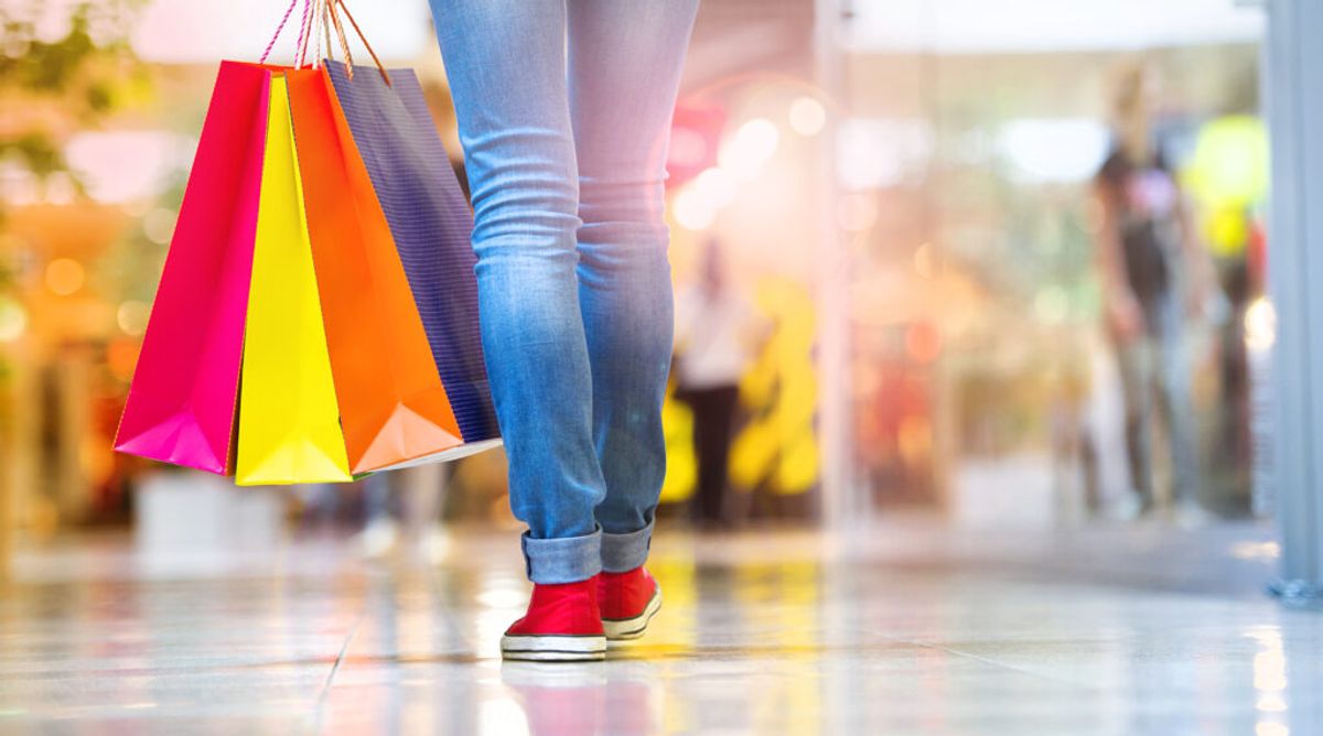 industries affected by recession, girl with shopping bags