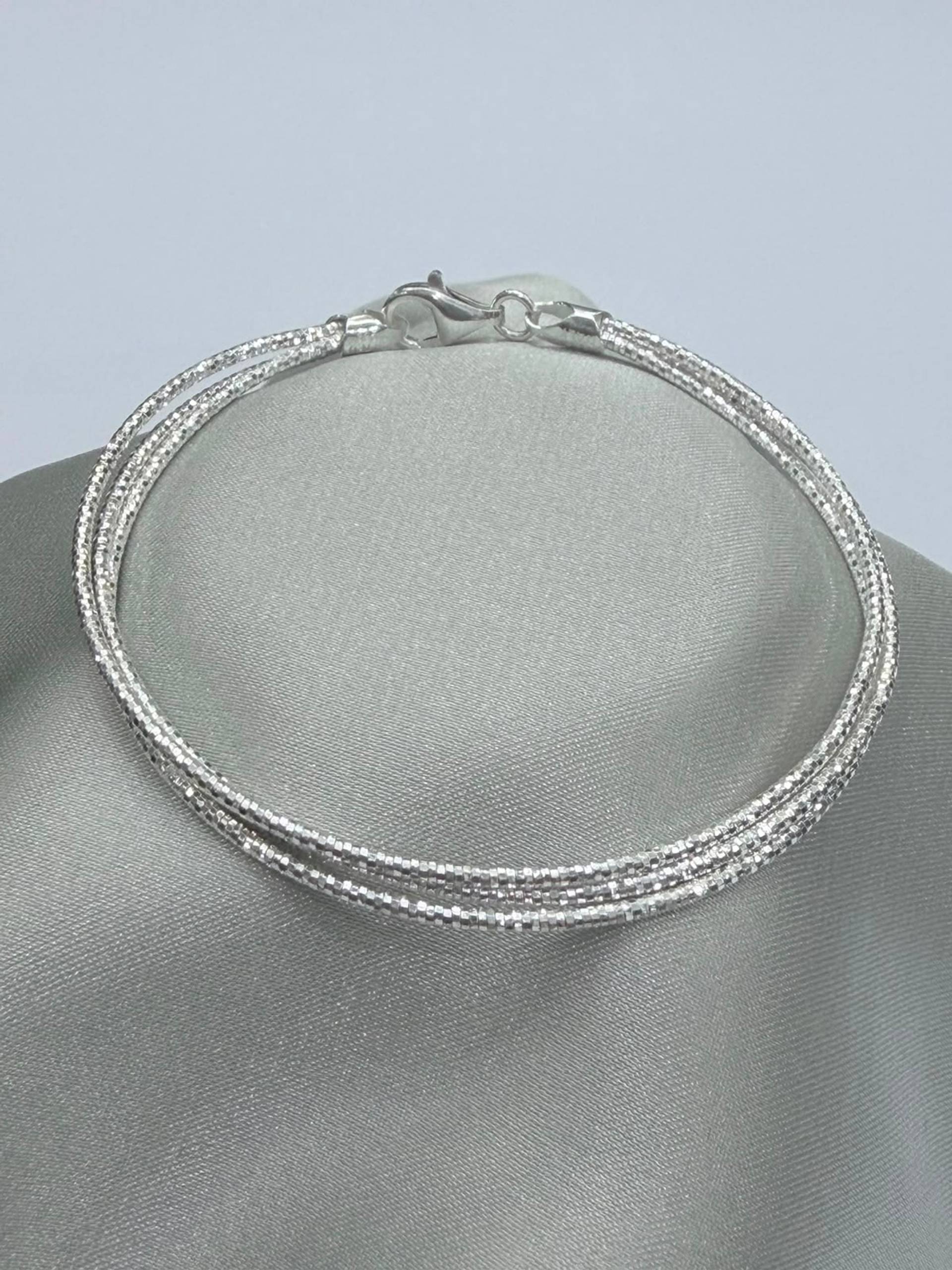 Pulsera Triple rígida brillosa