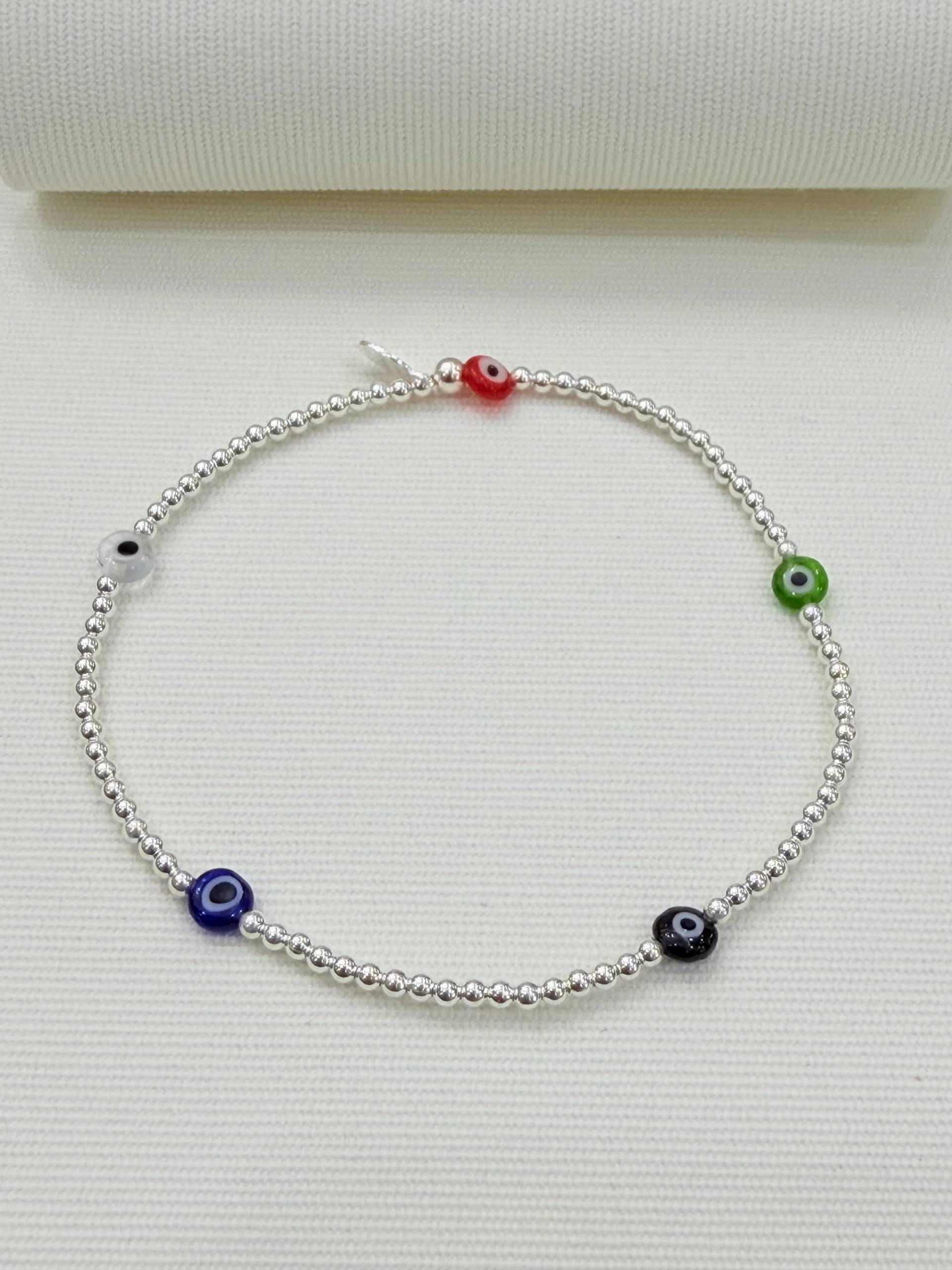 Pulsera ojitos