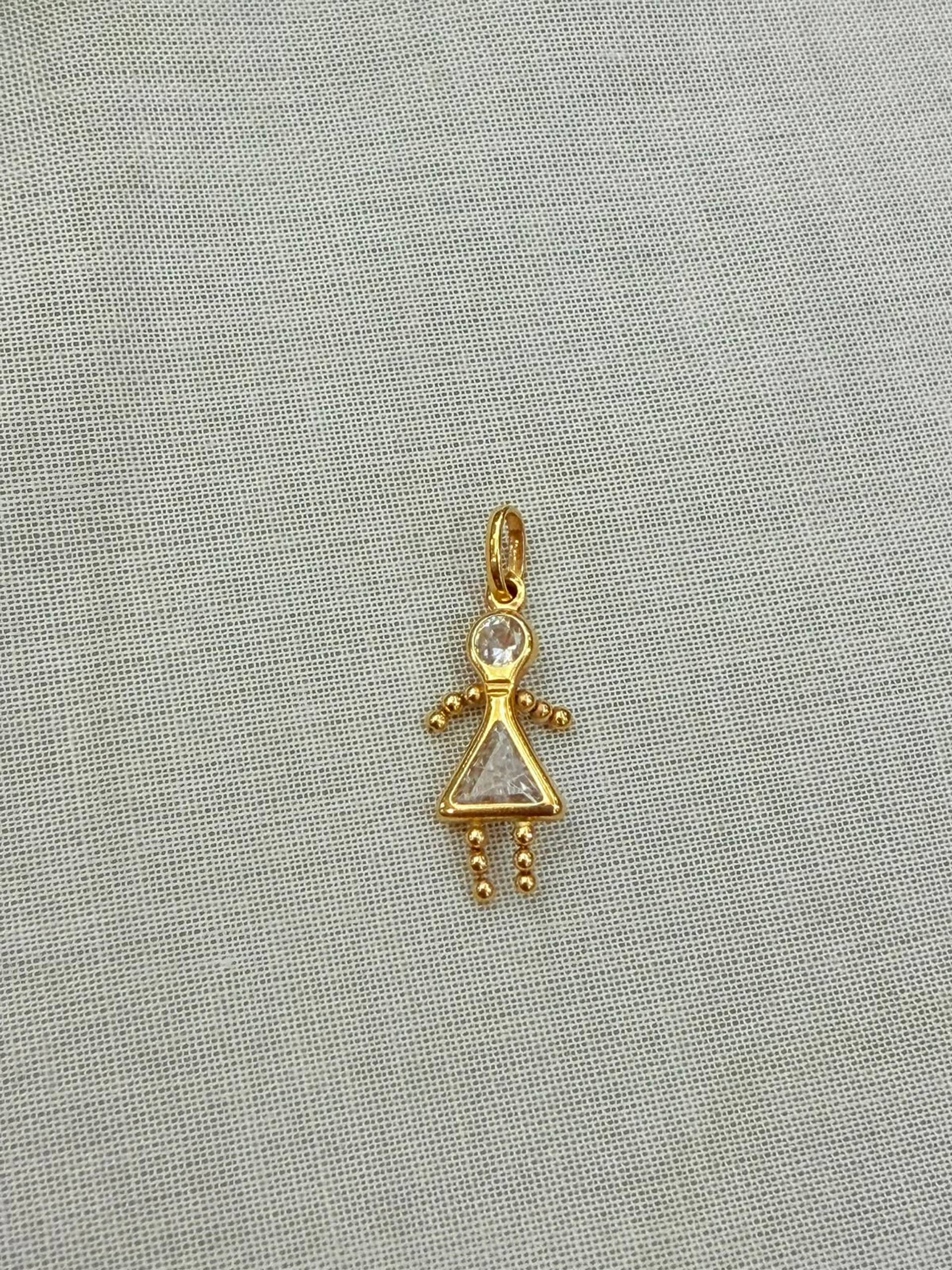 Dije Niña Silueta triangular y Oro 18K