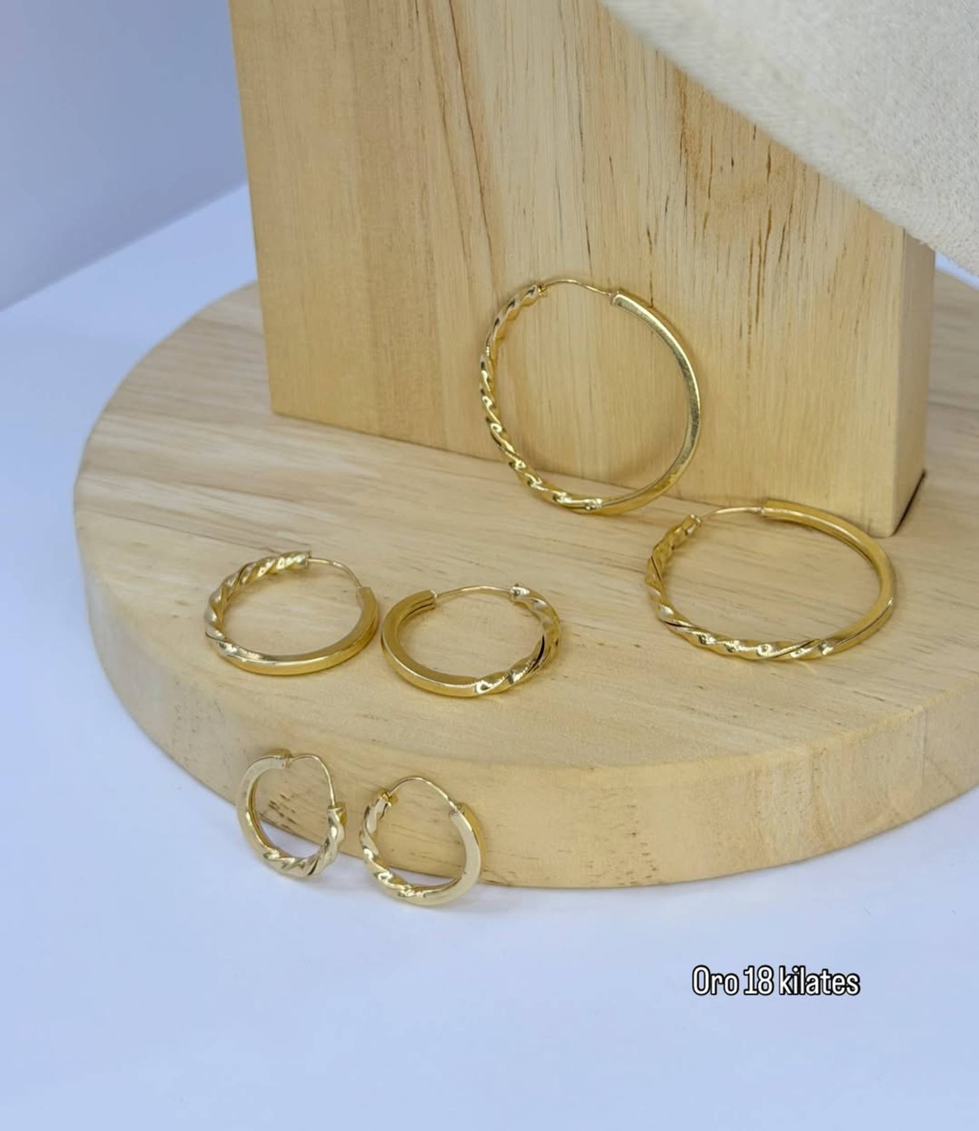 Argollas Trenzadas Oro 18 kilates