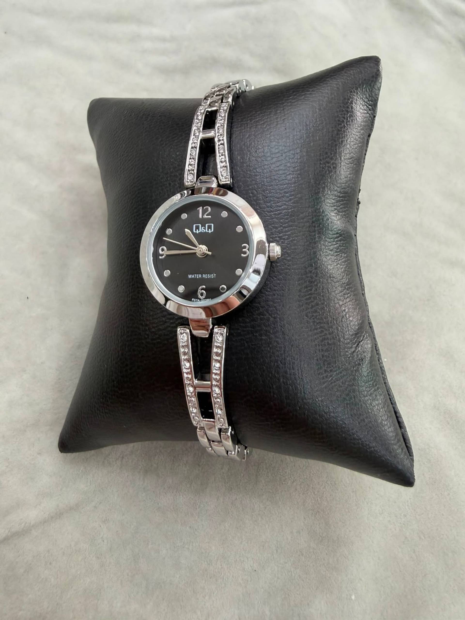 Reloj dama negro con destellos