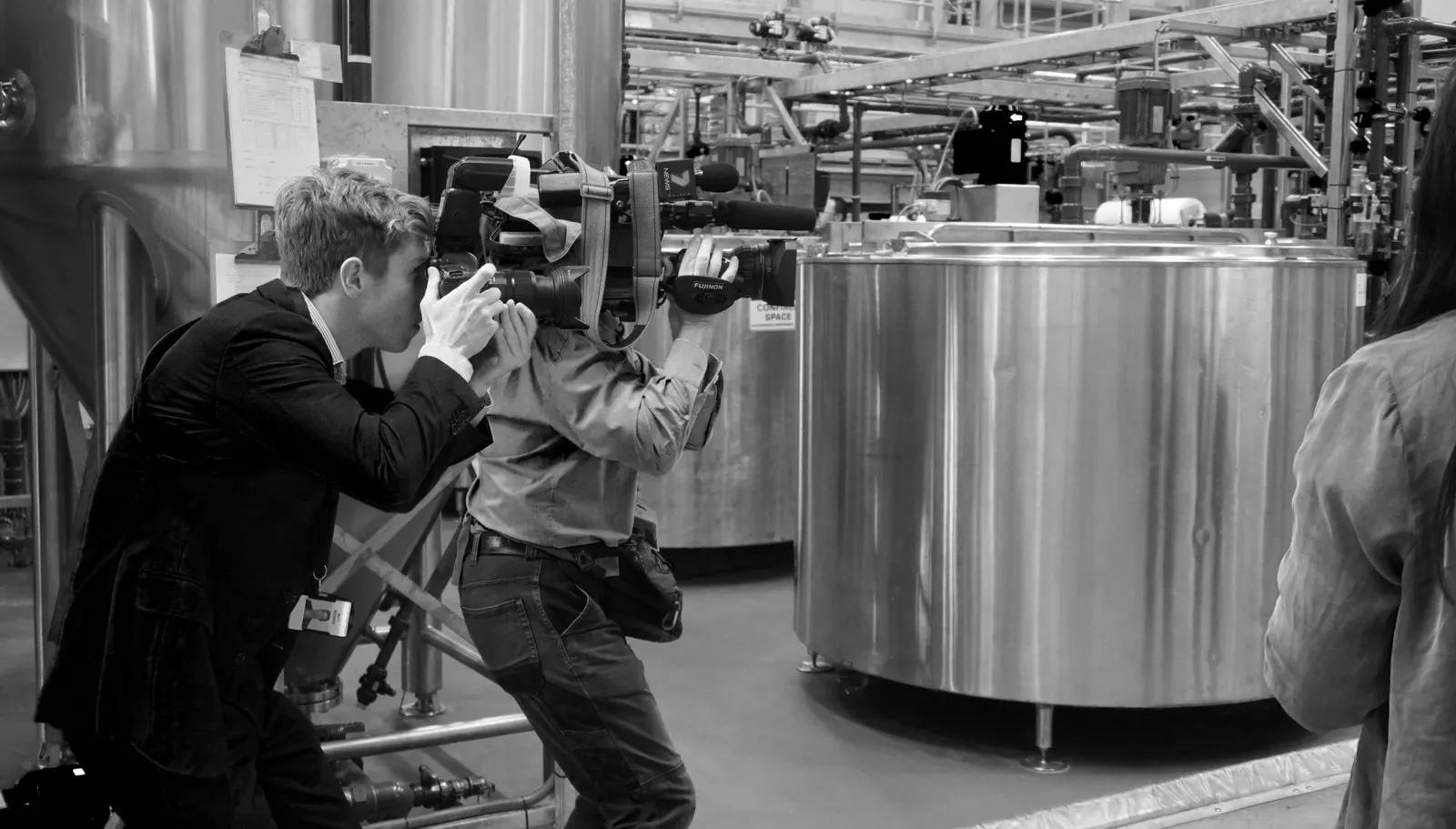 A SPOKE camera operator filming on location at a client site