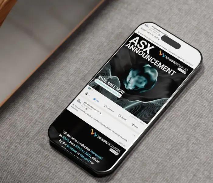 A phone showing a Winsome Resources ASX announcement post on social media.