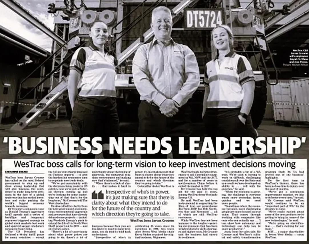 A newspaper spread headlined "Business needs leadership", with the WesTrac chief executive and two employees in high visibility shirts.