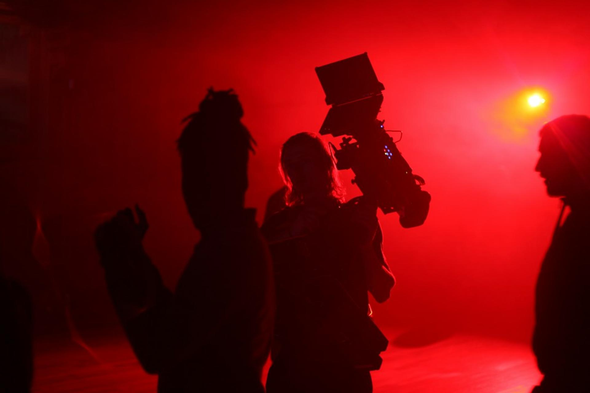 Premium brand film set with controlled lighting for corporate video production services