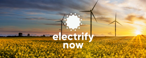 Electrify Now logo with wind farm field
