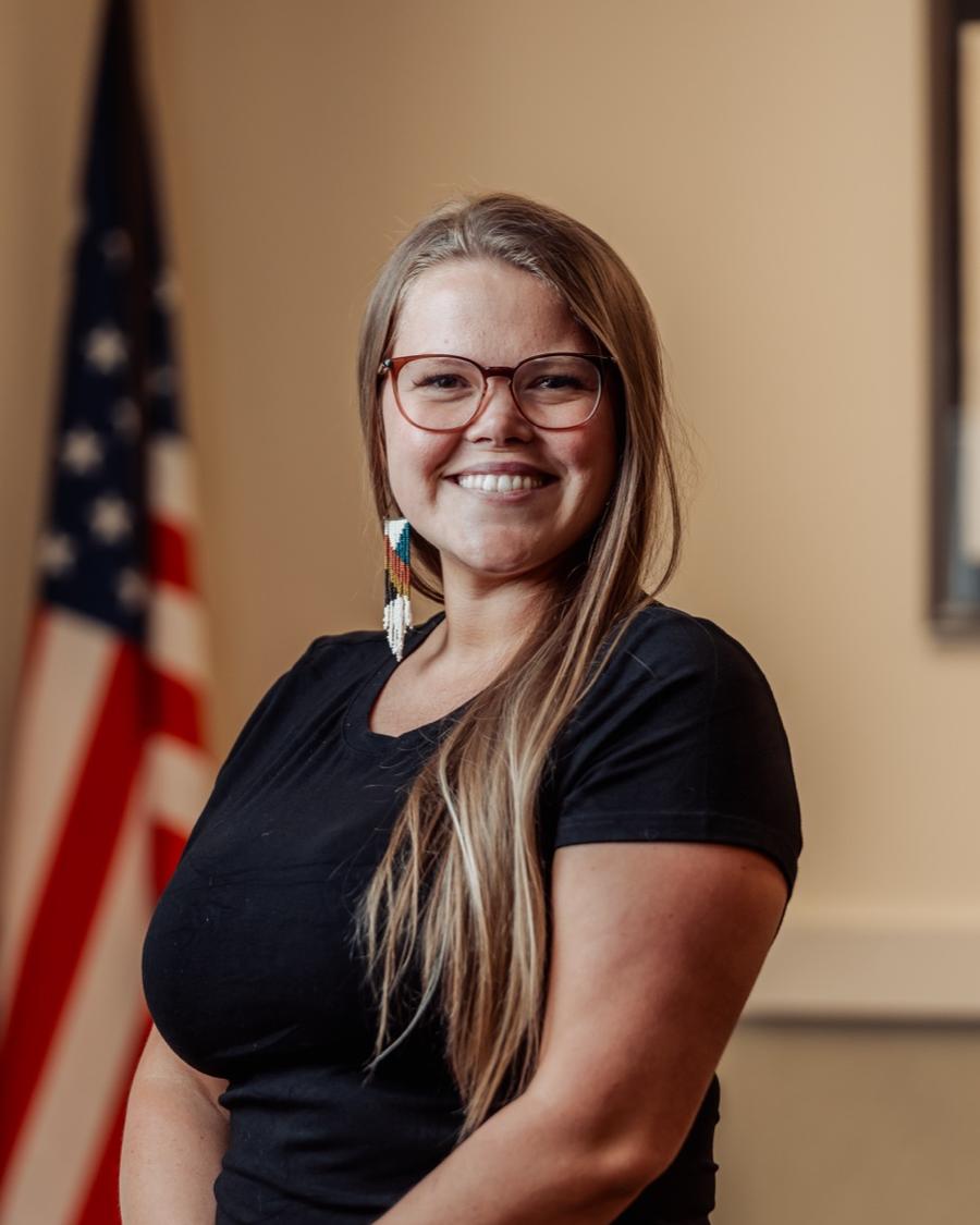 Portrait of Tara Gibson, Interim COO
