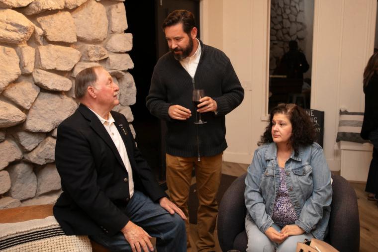 Guests enjoying the afternoon at Twisted Roots Winery during Sip, Savor, & Salute