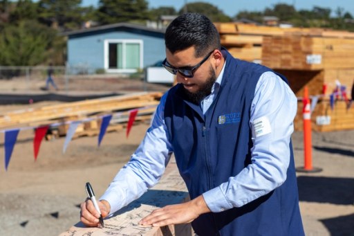 The Lightfighter Village wall raising at Fort Ord