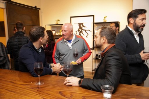 Supporters raising a glass for the VTC mission at Sip, Savor, & Salute