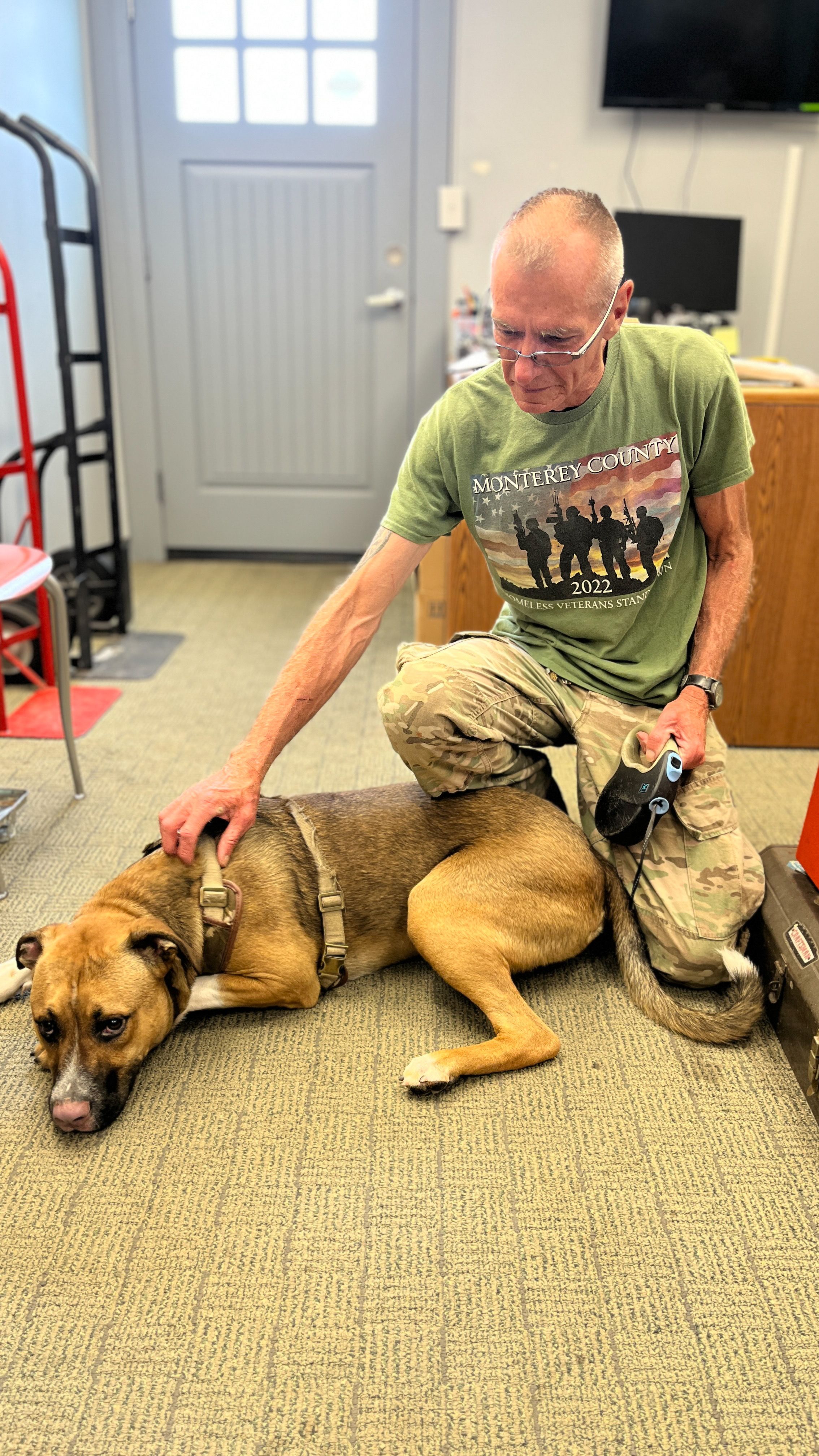 Kevin, a VTC graduate, with his dog Bandit