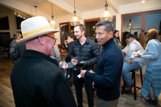 Attendees taking in the vineyard views during Sip, Savor, & Salute