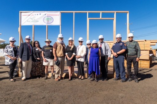 Guests at the Lightfighter Village wall-raising ceremony, November 2023