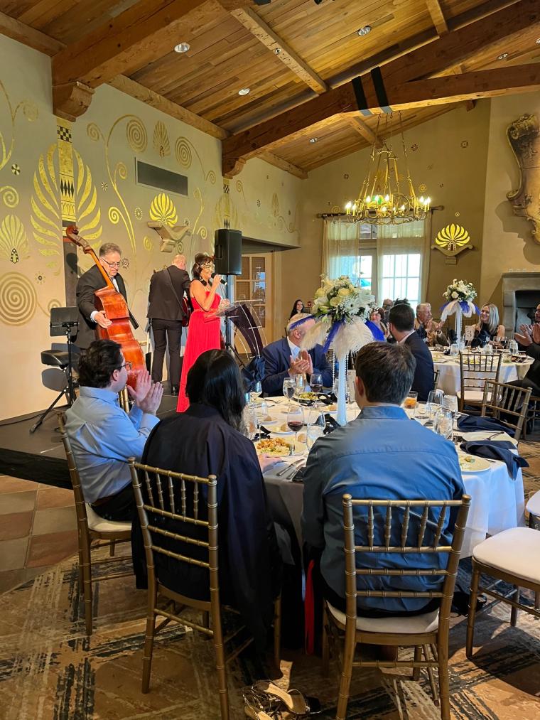 Attendees browsing the silent auction tables at the Hope for Heroes Gala