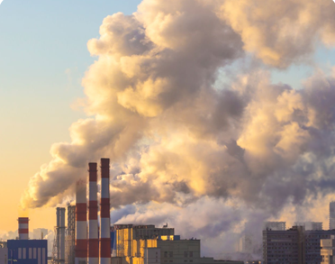 Smoke billowing from industrial chimneys