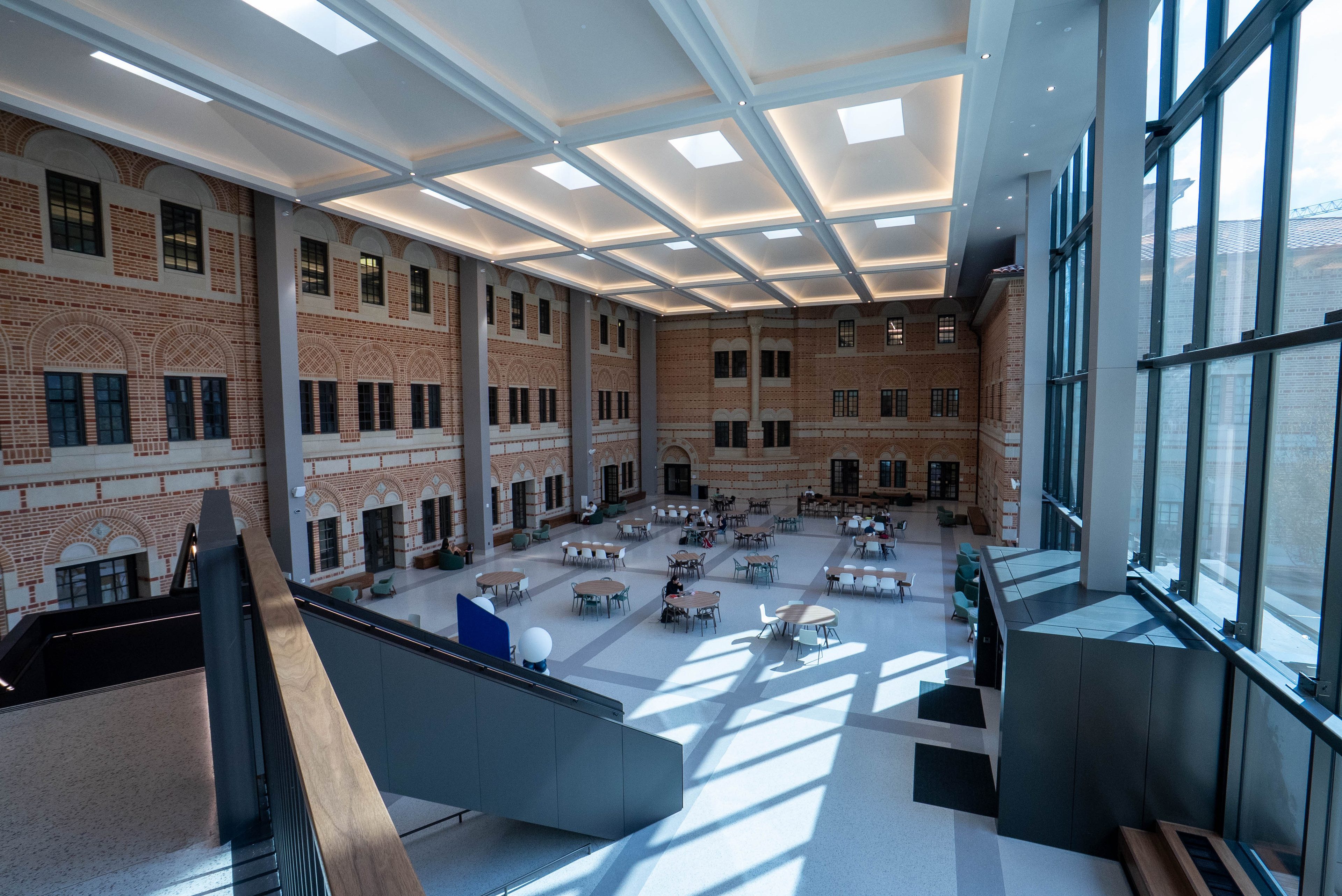 The skylit atrium of Virani Hall at Rice Business