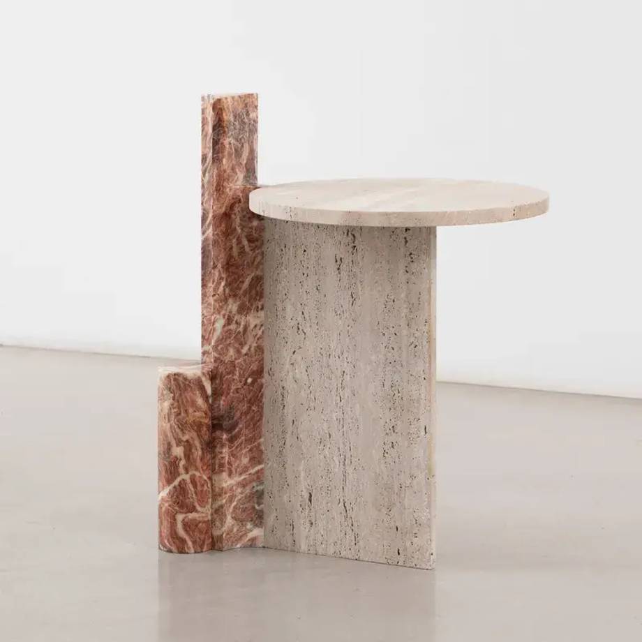 A unique marble coffee table designed by MMOOS., featured on their debut Italian design website built by Upclose.