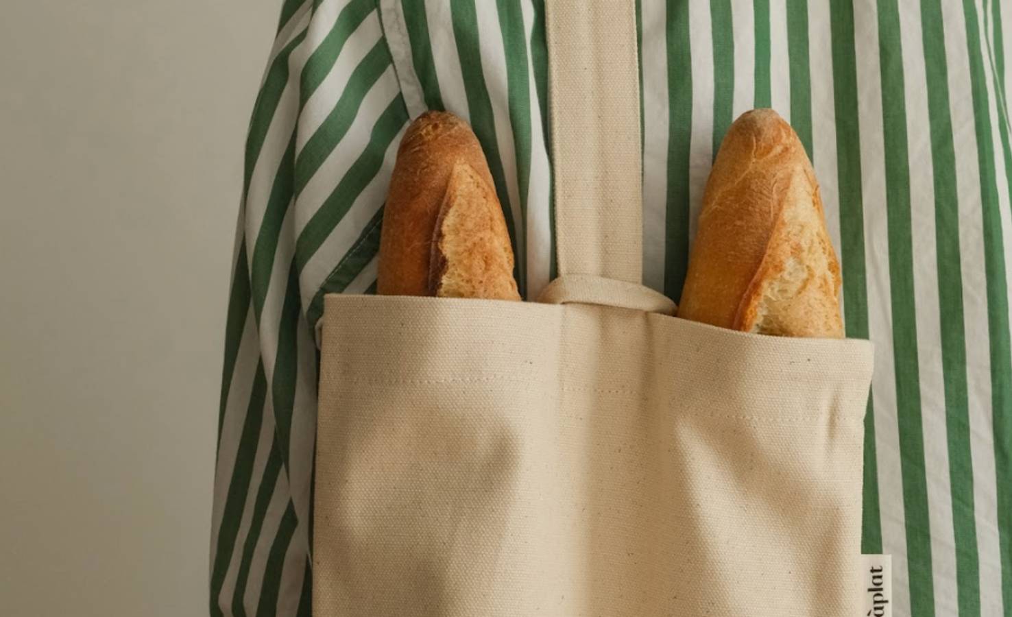 Brand identity photograph for OS Benefits featuring two baguettes, reflecting the platform's focus on the hospitality industry.