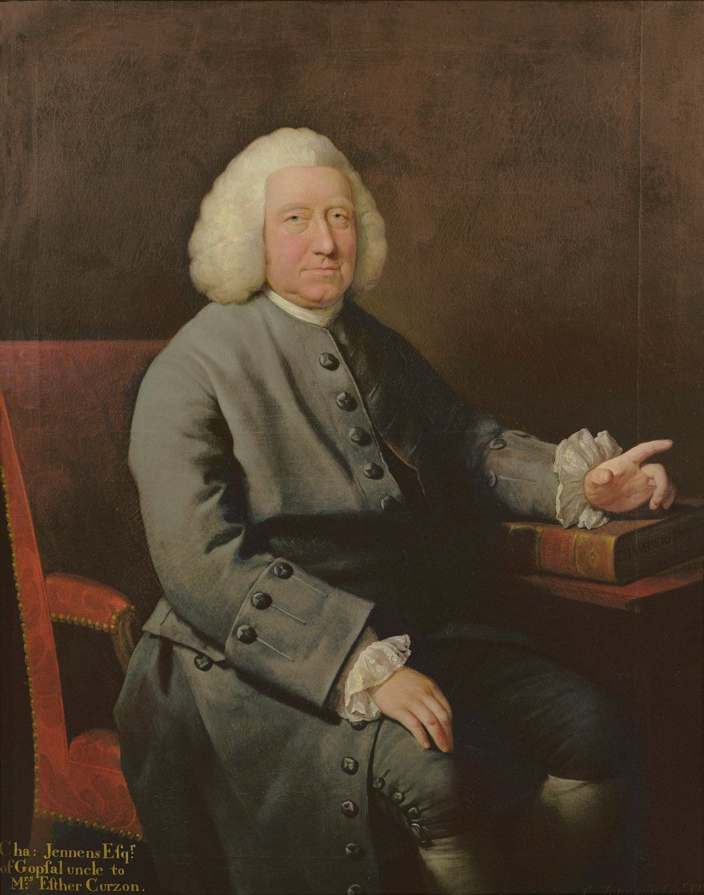 Oil portrait of an elderly man in a white wig and grey coat, seated in a red chair and pointing toward a book on the table beside him